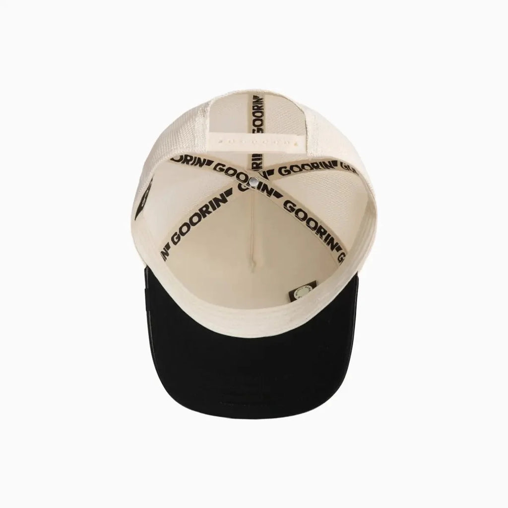 Casquette trucker crâne en similicuir