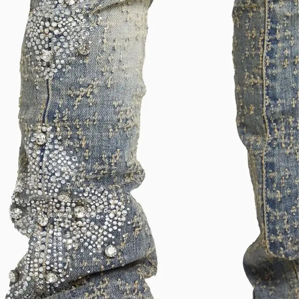Pantalón vaquero desgastado con cruz para niño