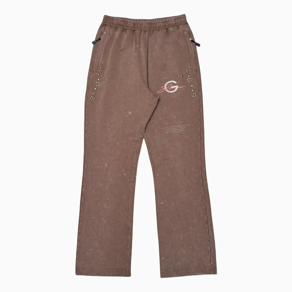 Conjunto de jogger con gráficos y tachuelas para hombre