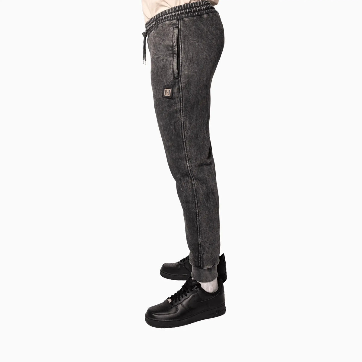 Pantalón de chándal de hombre en negro desgastado