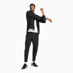 Pantalón de chándal Dri-Fit sin límites para hombre con puños con cremallera