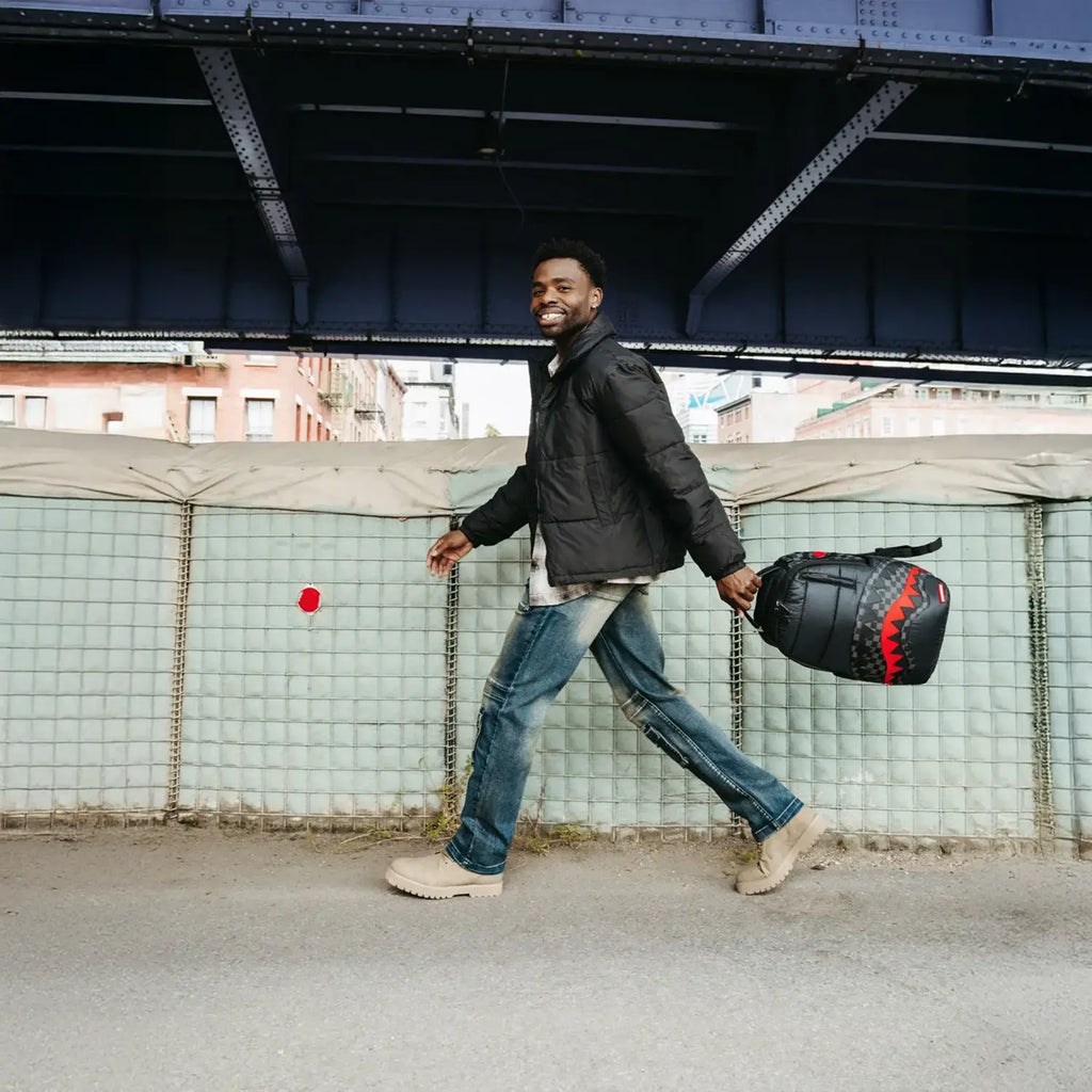 Sac à dos matelassé noir à carreaux