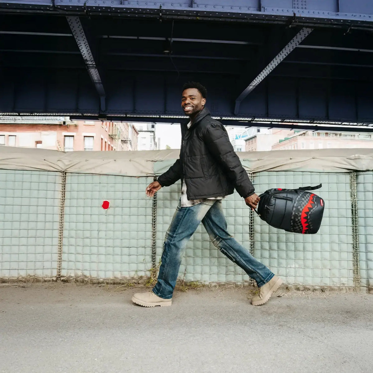 Sac à dos matelassé noir à carreaux