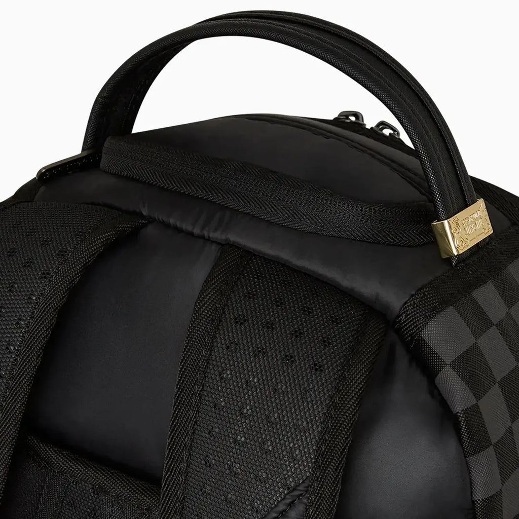 Sac à dos matelassé noir à carreaux