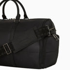 Sac de voyage noir en nylon matelassé à carreaux